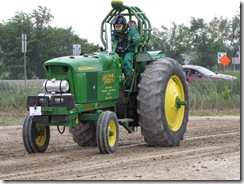 John Deere pulling tractor